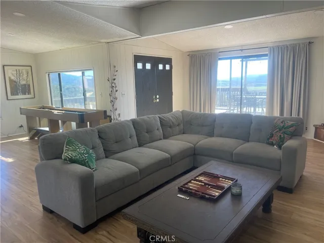 with plenty of windows and a sliding glass door that goes out to the deck you have plenty of room for entertaining