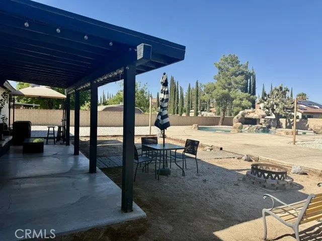 Backyard / covered patio area from side of house