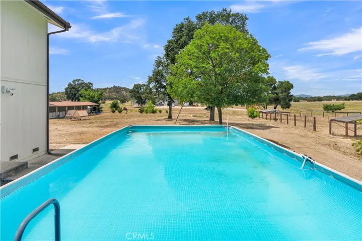 Sparkling Above Ground Pool with Deck