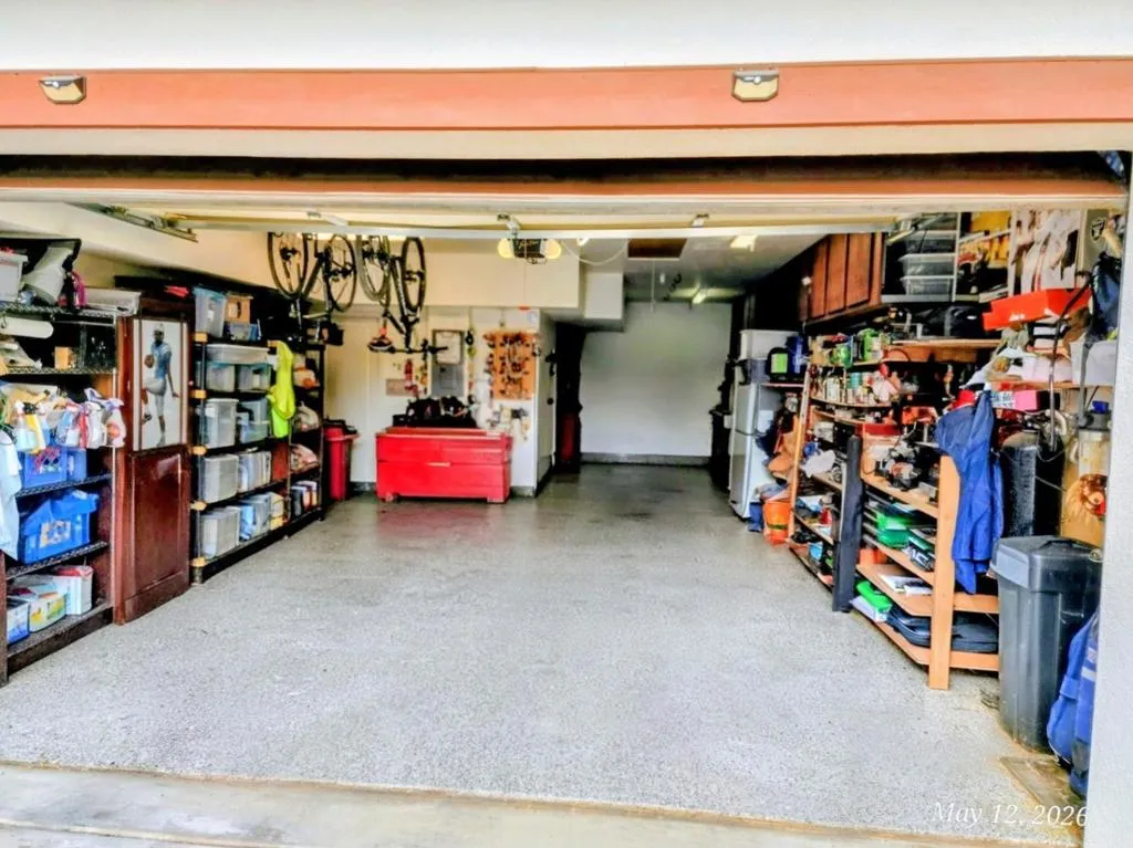 Large 3 Tandem Garage the Sealed Epoxy Flooring and Lots of Storage Cabinets and Shelving