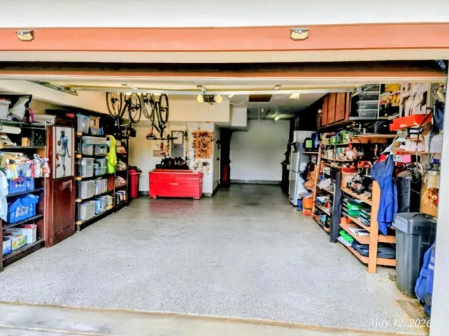 Large 3 Tandem Garage the Sealed Epoxy Flooring and Lots of Storage Cabinets and Shelving