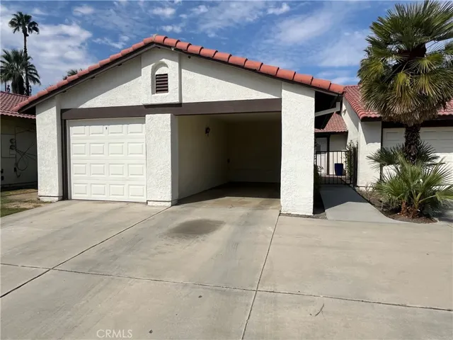 One Car Garage and One Car Port