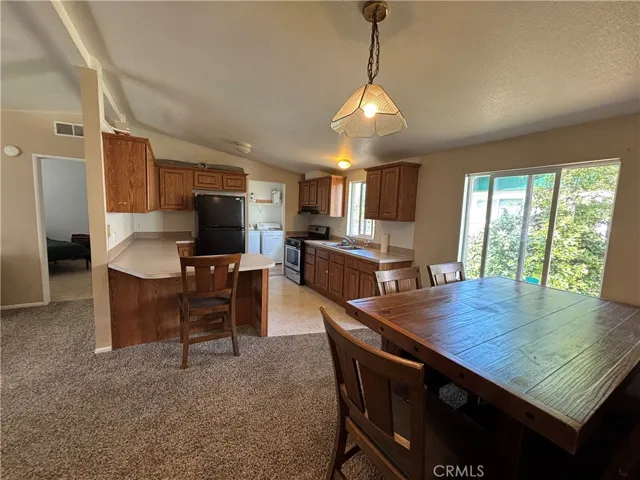 Dining area to kitchen.