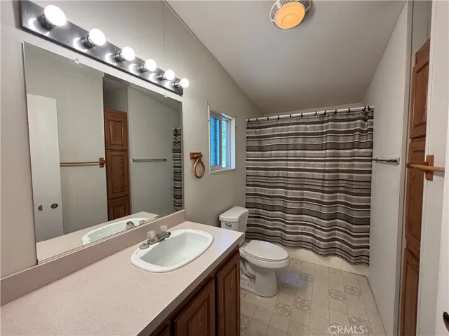 Main bathroom, tub in shower.
