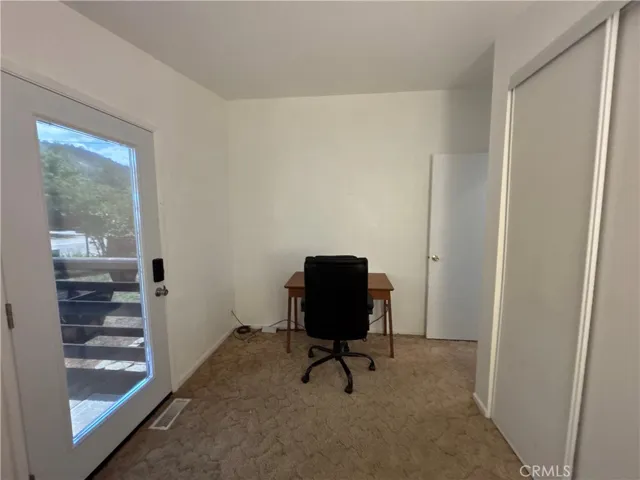 Smaller third bedroom or office W/exterior door/ramp