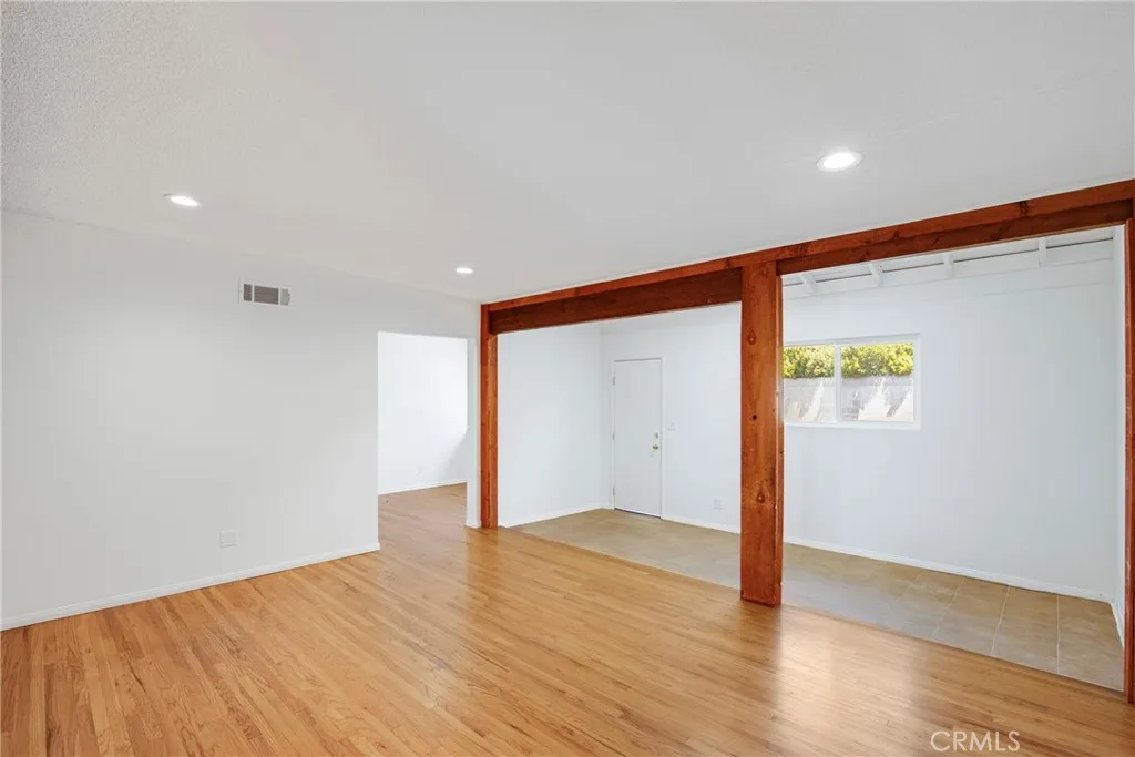 Living room with view of back addition and view of dining room