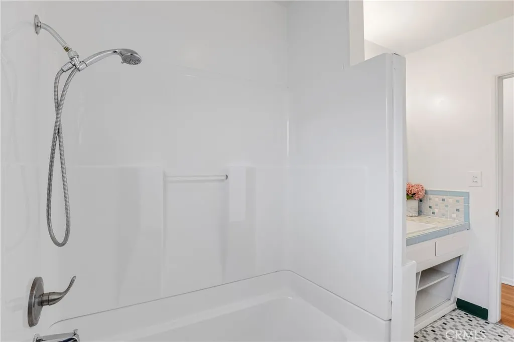 Hall bath, shower in tub