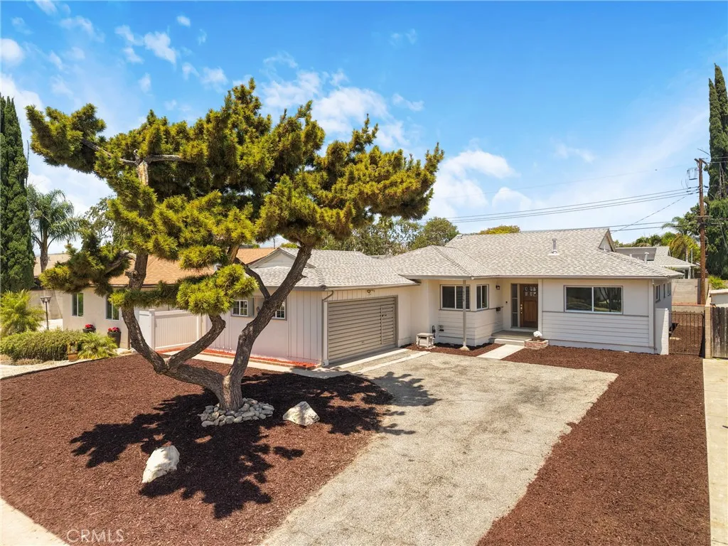 Front of home and tree, alternate view