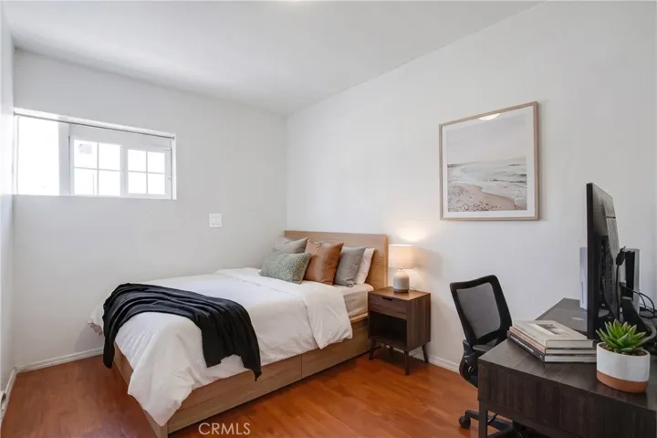Converted garage Bedroom 2, digitally enhanced and virtually staged