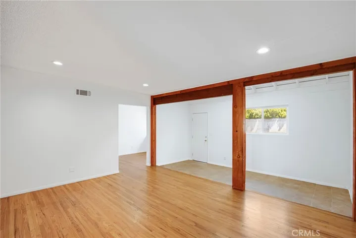 Living room with view of back addition and view of dining room