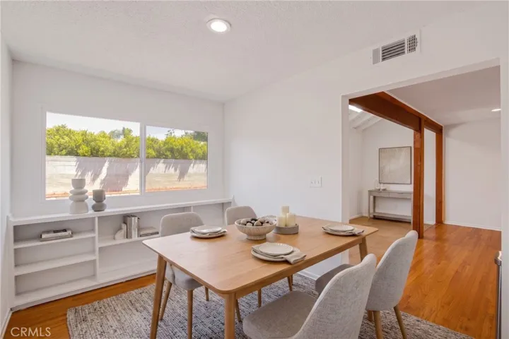 Dining room, digitally enhanced and virtually staged