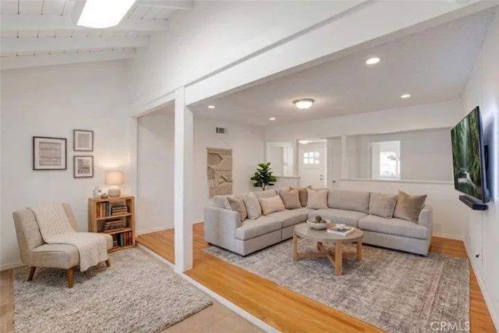 Living Room and reading knook, digitally enhanced and virtually staged