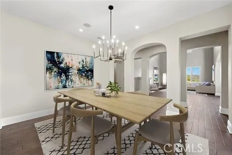 Dining area is virtually staged