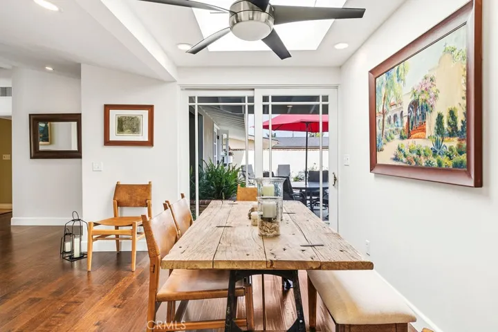 Former breezeway enclosed for additional dining area with skylight.
