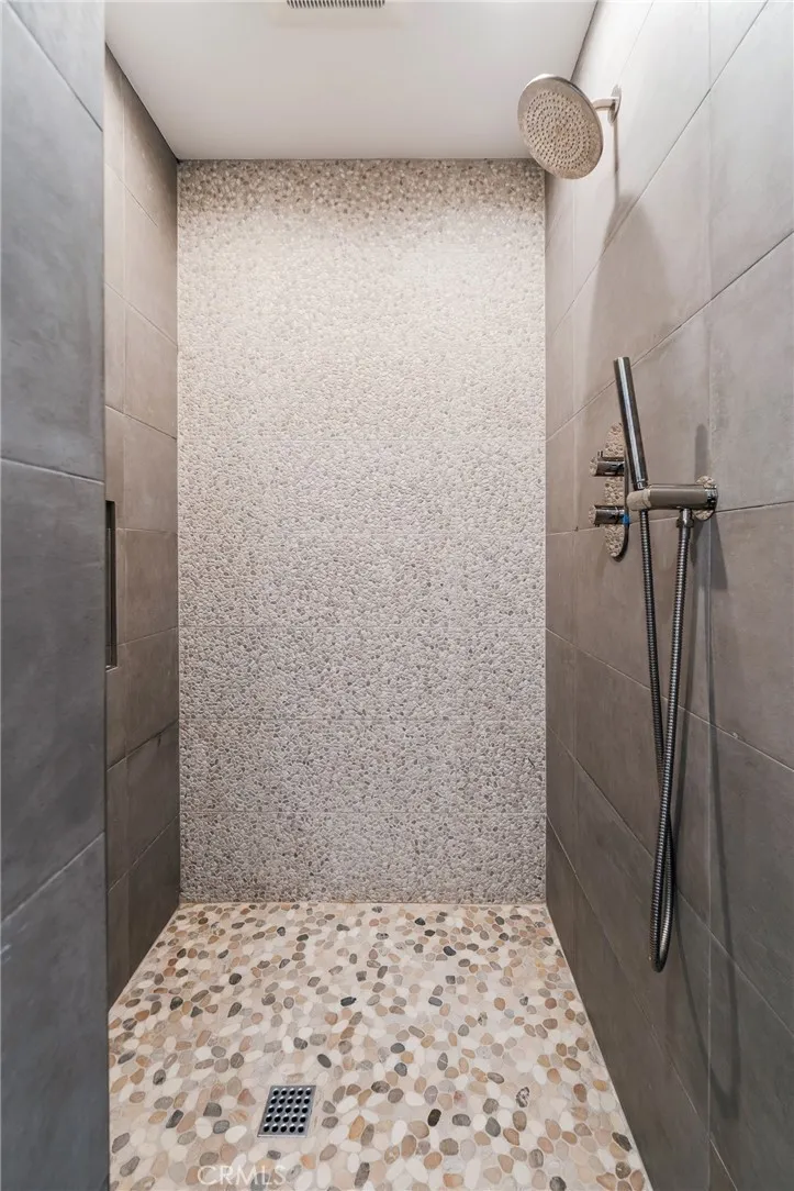 Shower in secondary bath on upper level.