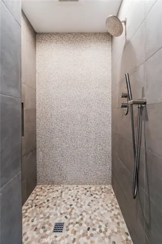 Shower in secondary bath on upper level.
