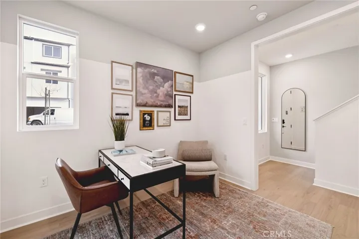 Model home first floor en-suite bedroom modeled as a Den and used for representational purposes only