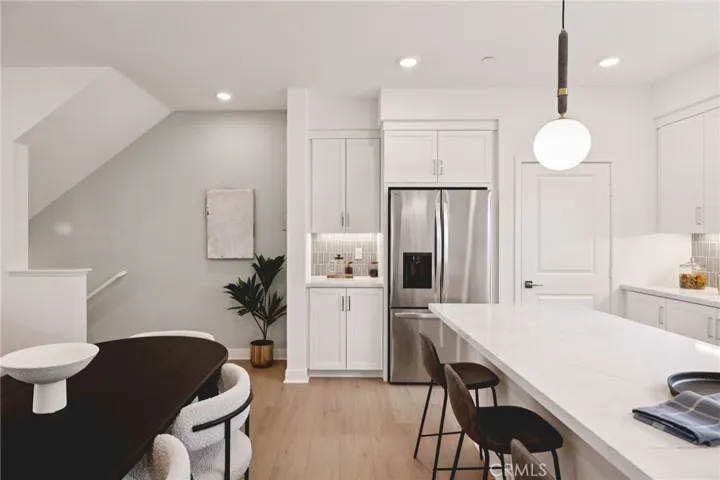Model home dining and kitchen area used for representational purposes only
