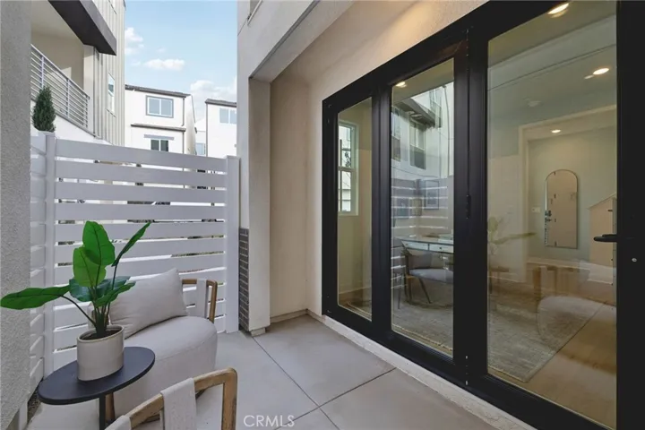 Model home first floor private patio outside junior primary suite. Used for representational purposes only.