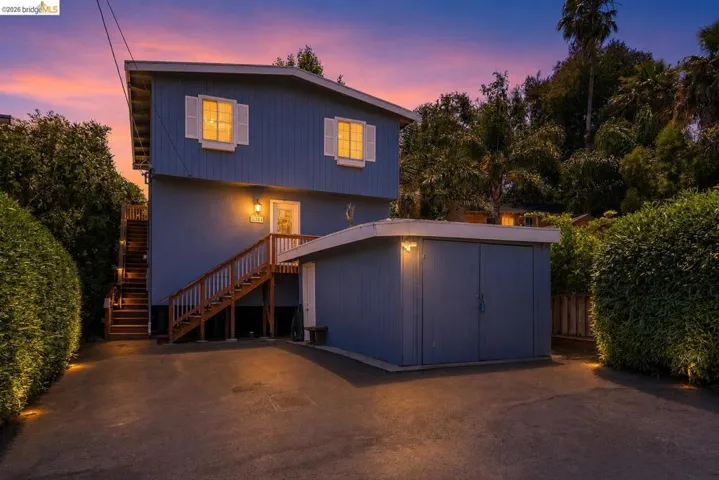 Two-story exterior with light blue siding