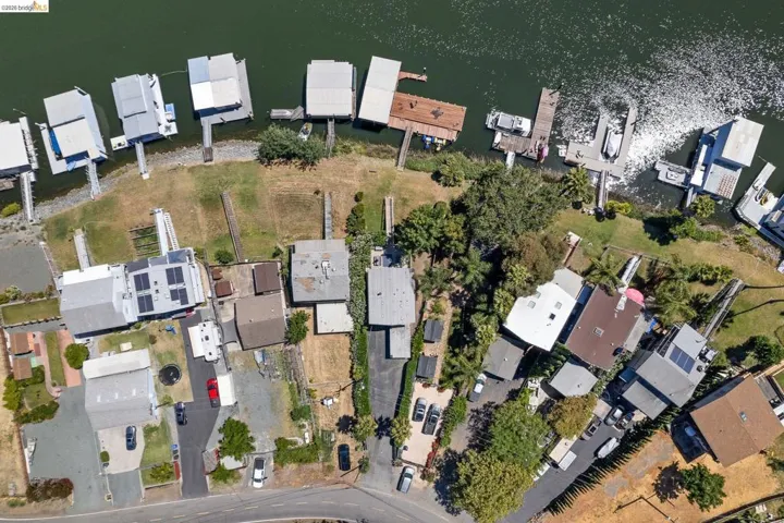 Waterfront properties featuring private boat docks and covered slips