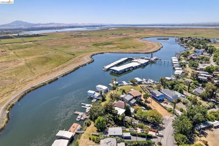Waterfront properties featuring private boat docks and covered slips