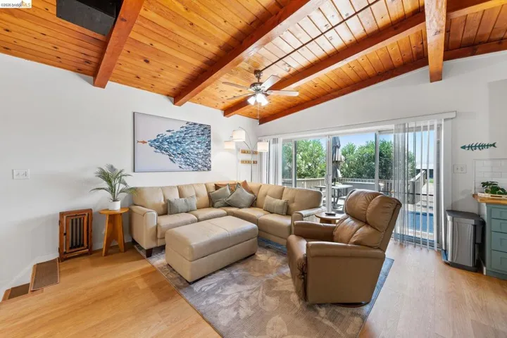 Vaulted wood-paneled ceiling with exposed beams