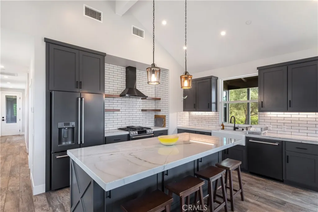 Quartz countertops, tile flooring.