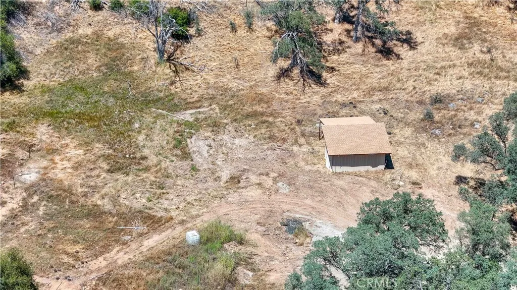 shed with well in front near right front corner