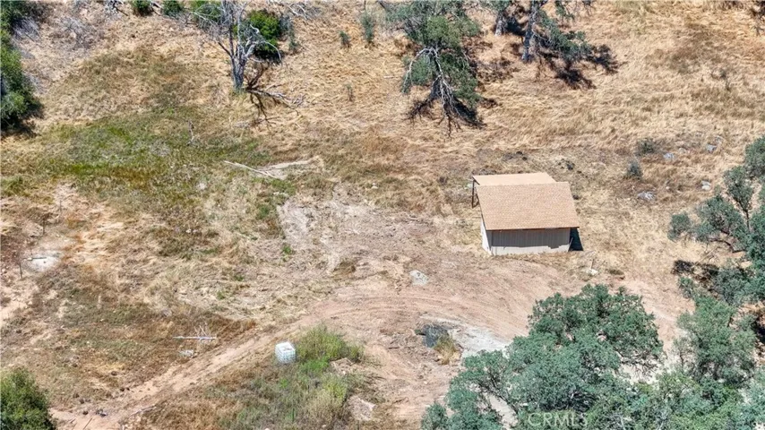 shed with well in front near right front corner