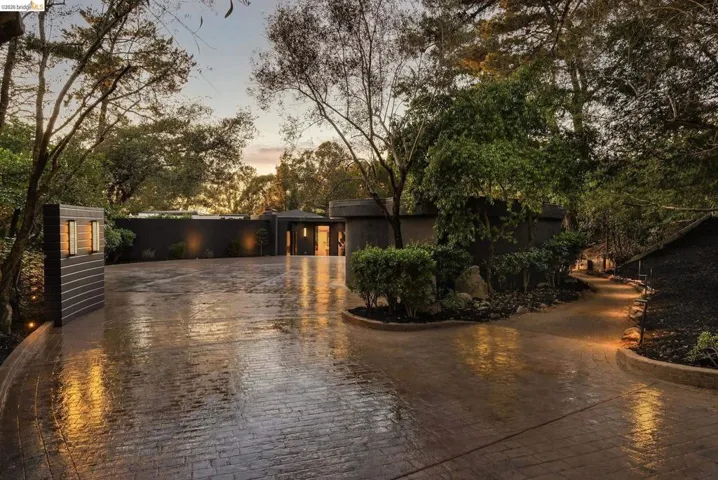 Spacious stamped concrete driveway leading to a contemporary residence