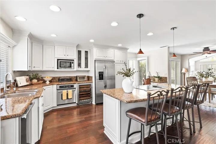 Kitchen with sub zero cooler and Miele Dishwasher.