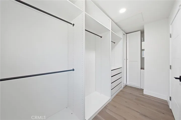 Primary bedroom with upgraded bathroom and walk-in closet