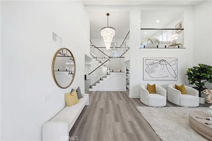 High ceiling living room, new floorings, upgraded staircase