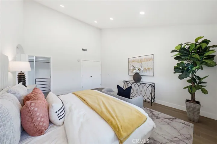 Primary bedroom with upgraded bathroom and walk-in closet