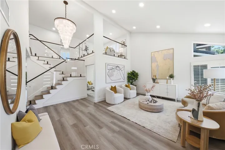 High ceiling living room, new floorings, upgraded staircase