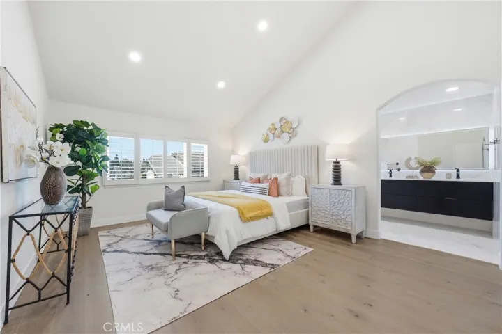 Primary bedroom with upgraded bathroom and walk-in closet