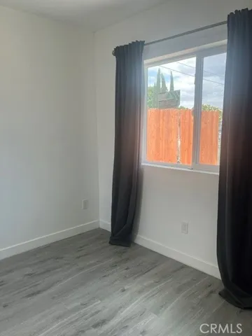 Bedroom has nice window.