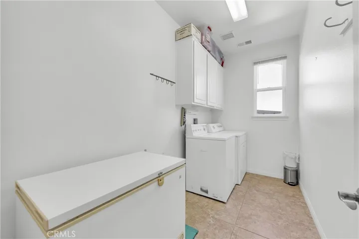 laundry room next to bedroom 2
