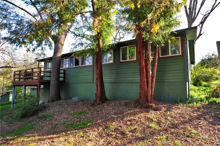 Back of home, trees, good lighting.