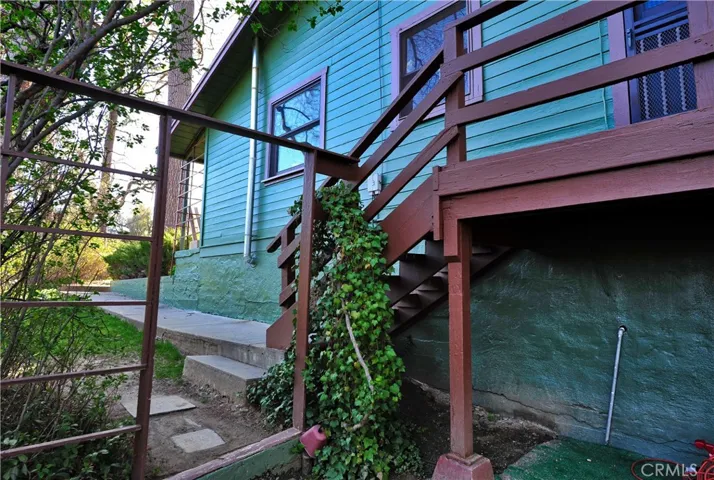 Deck leading to side of home.