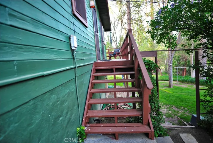 Stairs leading into laundry room.