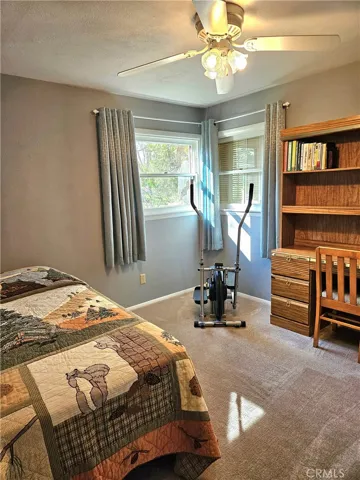 Bedroom #2. Carpet, view of side yard.