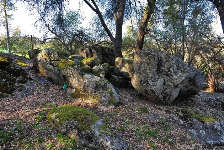 More artfully place rock outcroppings.