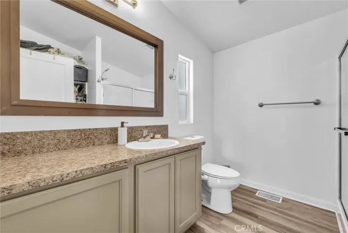 primary restroom with granite counters