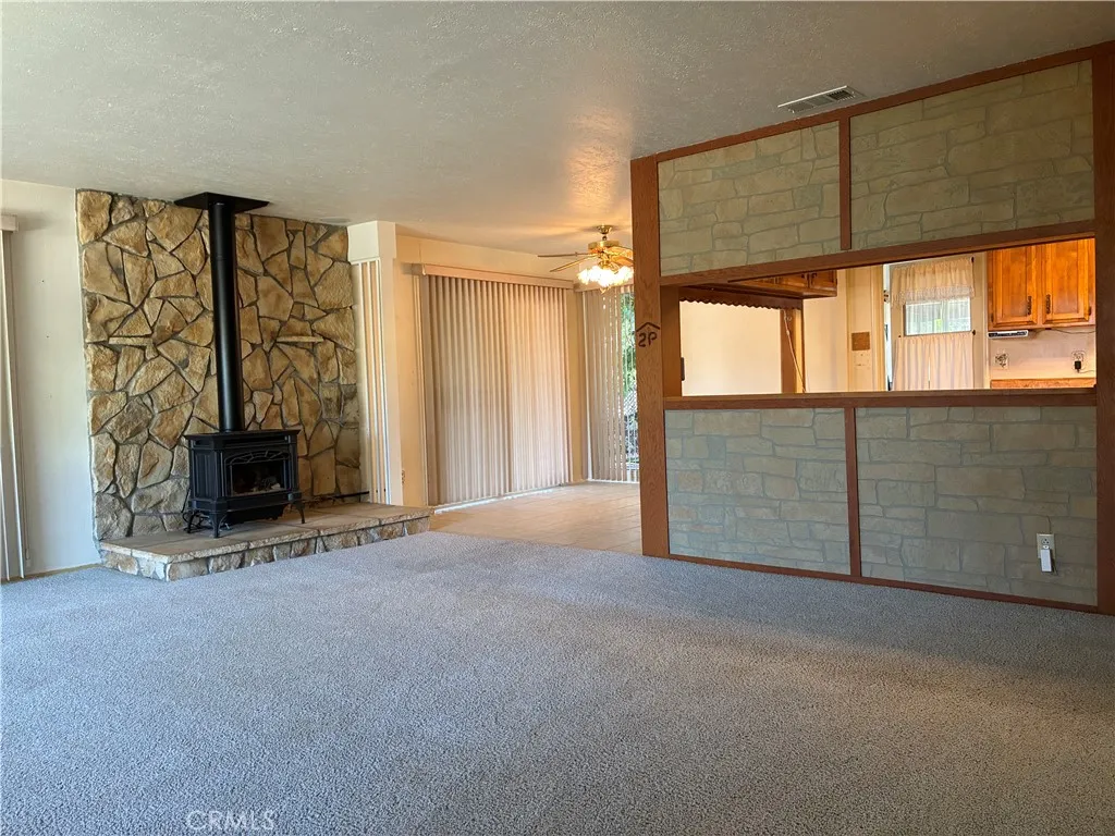 Windows and sliding glass doors add SO MUCH light and brightness to this wonderful home!