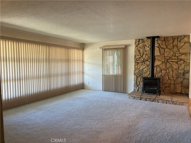 This full wall of windows allows the sunshine to light up this room!!!