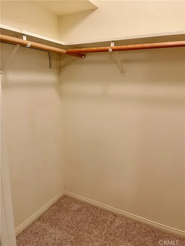 Walk-in closet in Primary Bedroom
