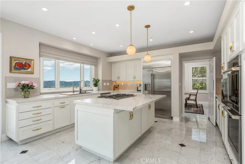 The property features a kitchen remodel completed in May 2025, with design and construction services provided by S Becker Enterprises. Interior design and staging were curated by Victoria Dyer Designs of Westlake Village.