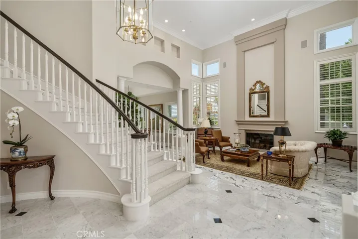 Formal living room featuring marble flooring.